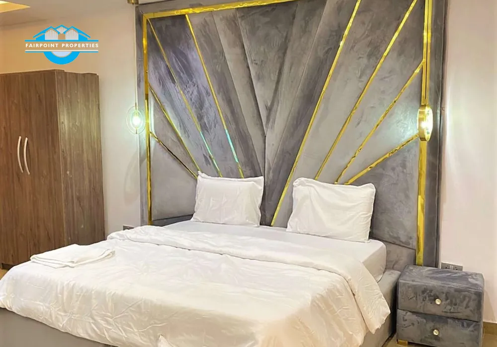 Large Bedroom - fitted with king size bed, smart Tv that comes with DSTv full package and netflix, Air conditioner, luxury bathroom, and luxury decorations
