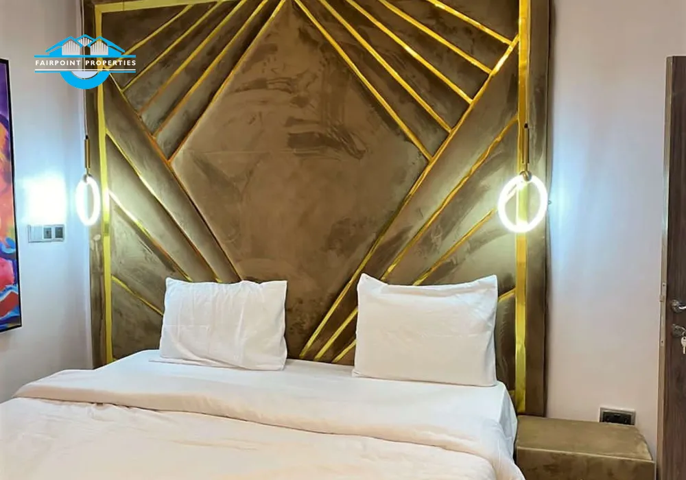 Large Bedroom - fitted with king size bed, smart Tv that comes with DSTv full package and netflix, Air conditioner, luxury bathroom, and luxury decorations