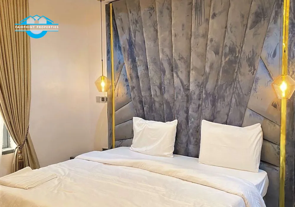 Large Bedroom - fitted with king size bed, smart Tv that comes with DSTv full package and netflix, Air conditioner, luxury bathroom, and luxury decorations