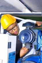 The CEO installing the generator