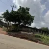 1 Acre of Land Fenced directly With 4 Shops