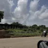 1 Acre of Land Fenced directly With 4 Shops